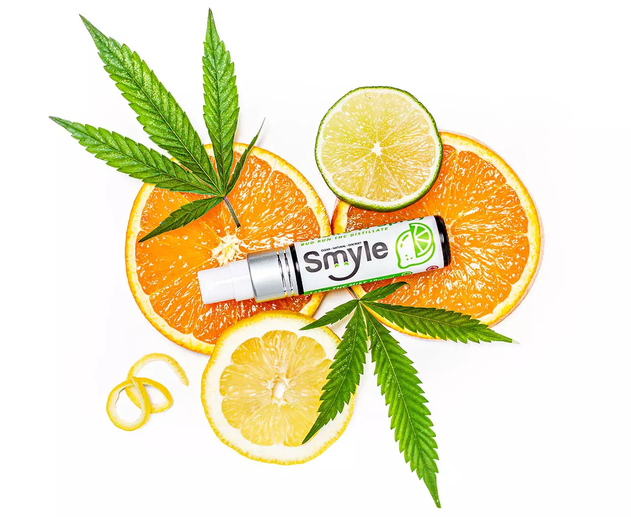 Smyle sublinual spray on citrus with cannabis leaves